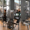 fitness center with rows of treadmills and modern style flooring
